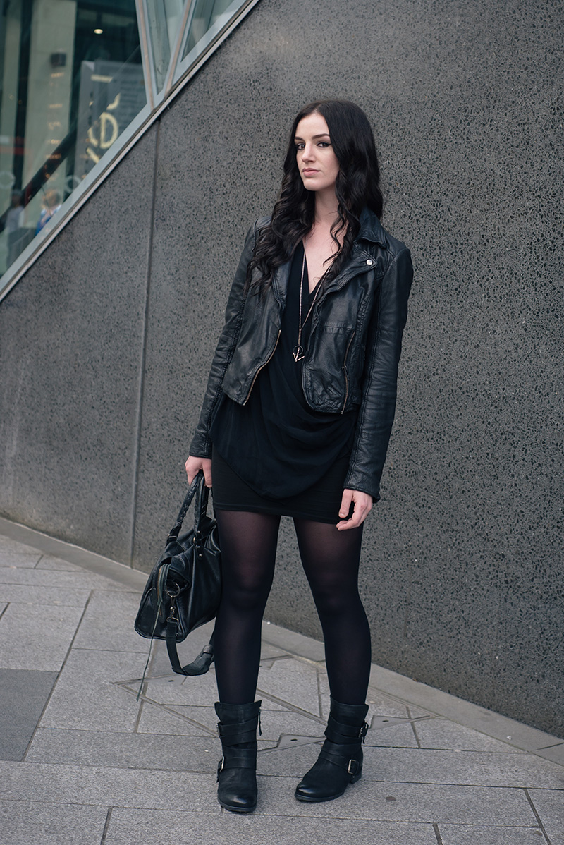 Fashion blogger Stephanie of FAIIINT wearing MuuBaa leather biker jacket, River Island drape top, ASOS mini skirt, Daniel Footwear Marvelous biker boots, Hvnter Gvtherer lacustrine necklace, Balenciaga city bag. Casual all black everything dark street style outfit.