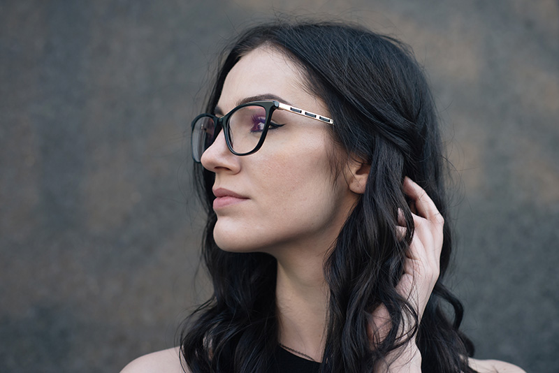 Fashion blogger Stephanie of FAIIINT wearing Vision Express black Heritage frames eyewear