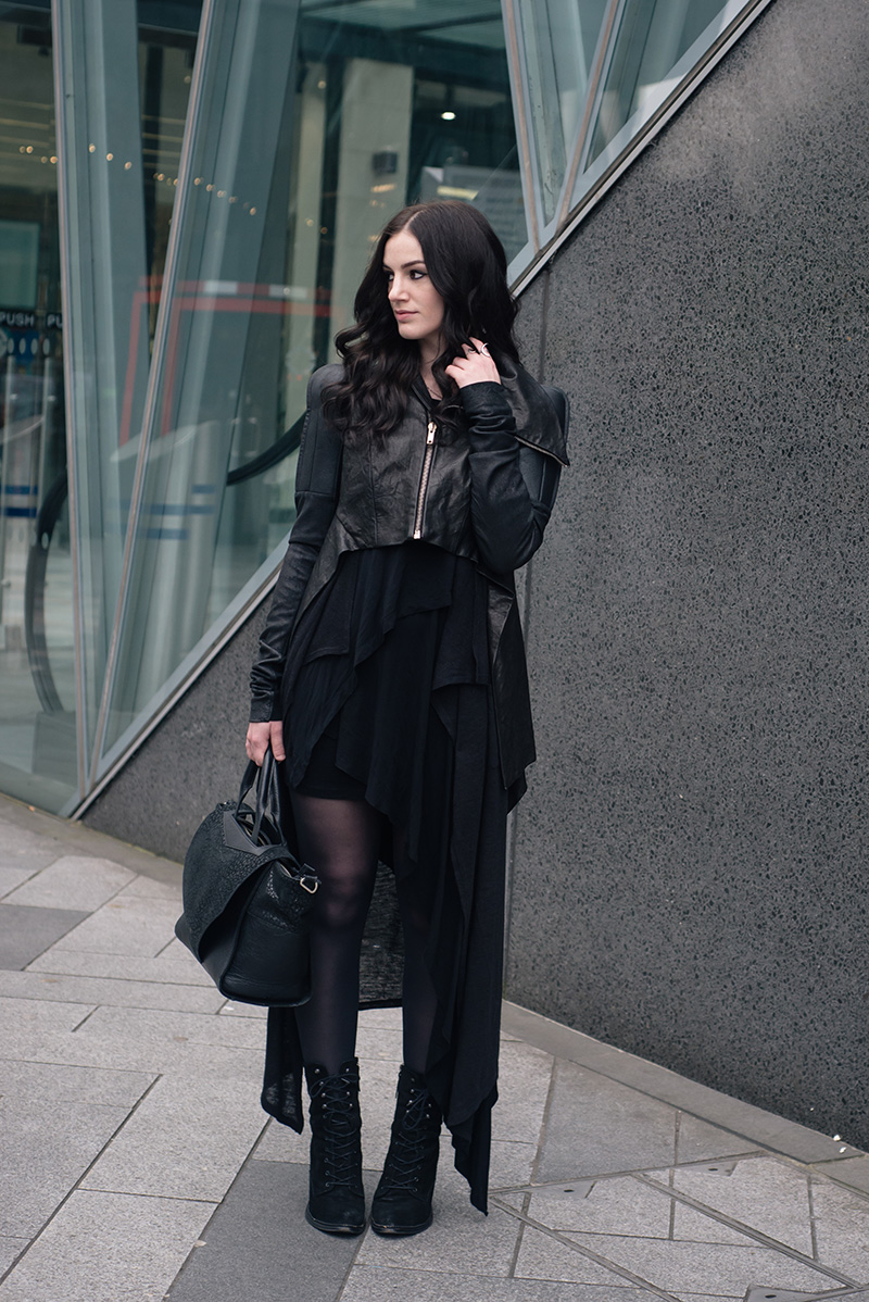 Fashion blogger Stephanie of FAIIINT wearing Rick Owens draped back cropped leather jacket fw10, H&M maxi cardigan, FAIIINT Splice layered dress, Kurt Geiger Saturn lace up boots, Bracher Emden bag. All black everything dark goth street style outfit.