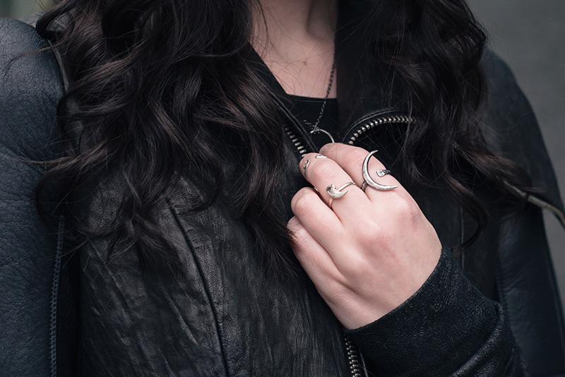 Fashion blogger Stephanie of FAIIINT wearing Rick Owens draped back cropped leather jacket fw10, Wolf + Sadie Theurgy crescent silver ring, Birds N Bones Taxidea silver claw ring and Mus Hip bone knuckle ring. All black everything dark goth street style outfit details.