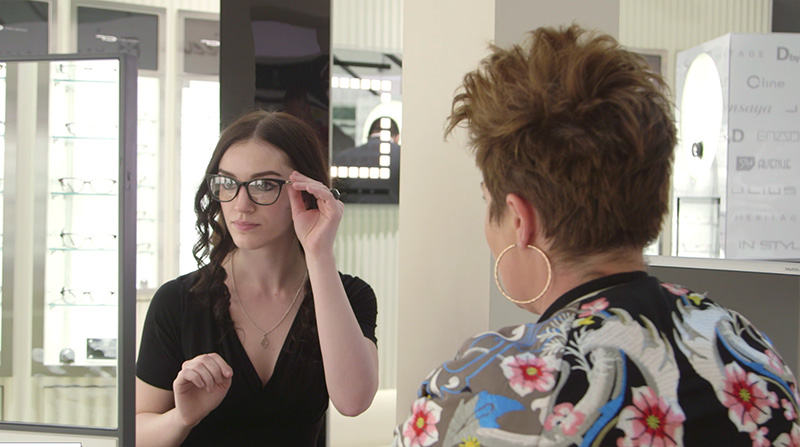 Fashion blogger Stephanie of FAIIINT with stylist Gemma Sheppard choosing Vision Express glasses frames