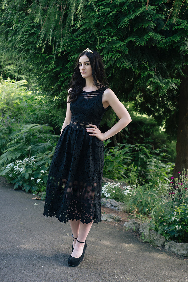 Fashion blogger Stephanie of FAIIINT wearing ASOS gold leaf crown headband, Miss Selfridge mixed lace dress, Aldo suede wedges. All black everything gothic wedding guest outfit, dark street style.