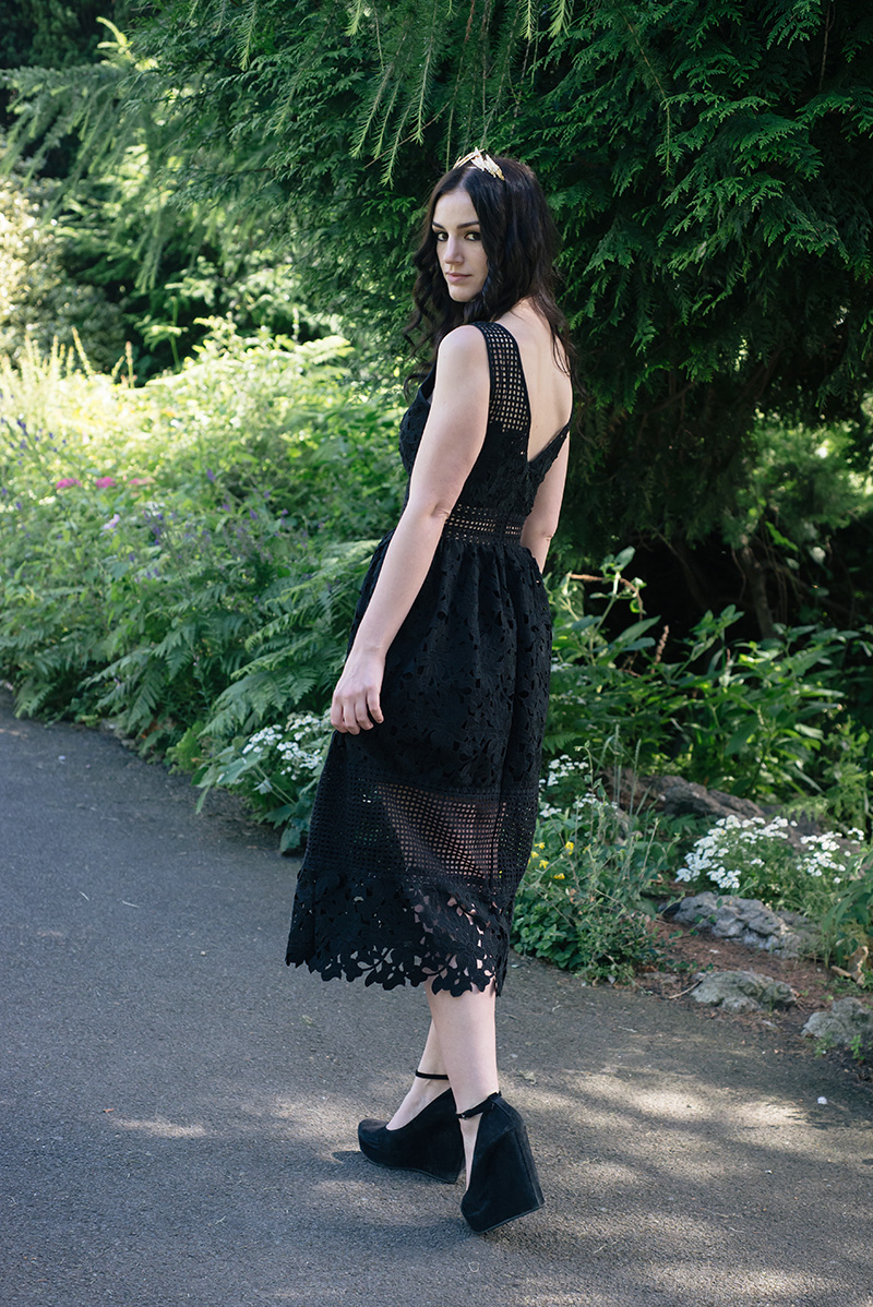 Fashion blogger Stephanie of FAIIINT wearing ASOS gold leaf crown headband, Miss Selfridge mixed lace dress, Aldo suede wedges. All black everything gothic wedding guest outfit, dark street style.