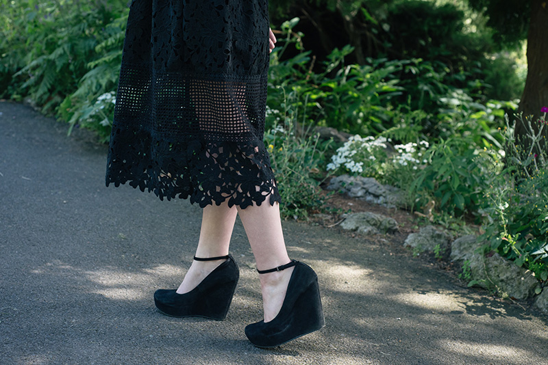 Fashion blogger Stephanie of FAIIINT wearing Miss Selfridge mixed lace dress, Aldo suede wedges. All black outfit details.