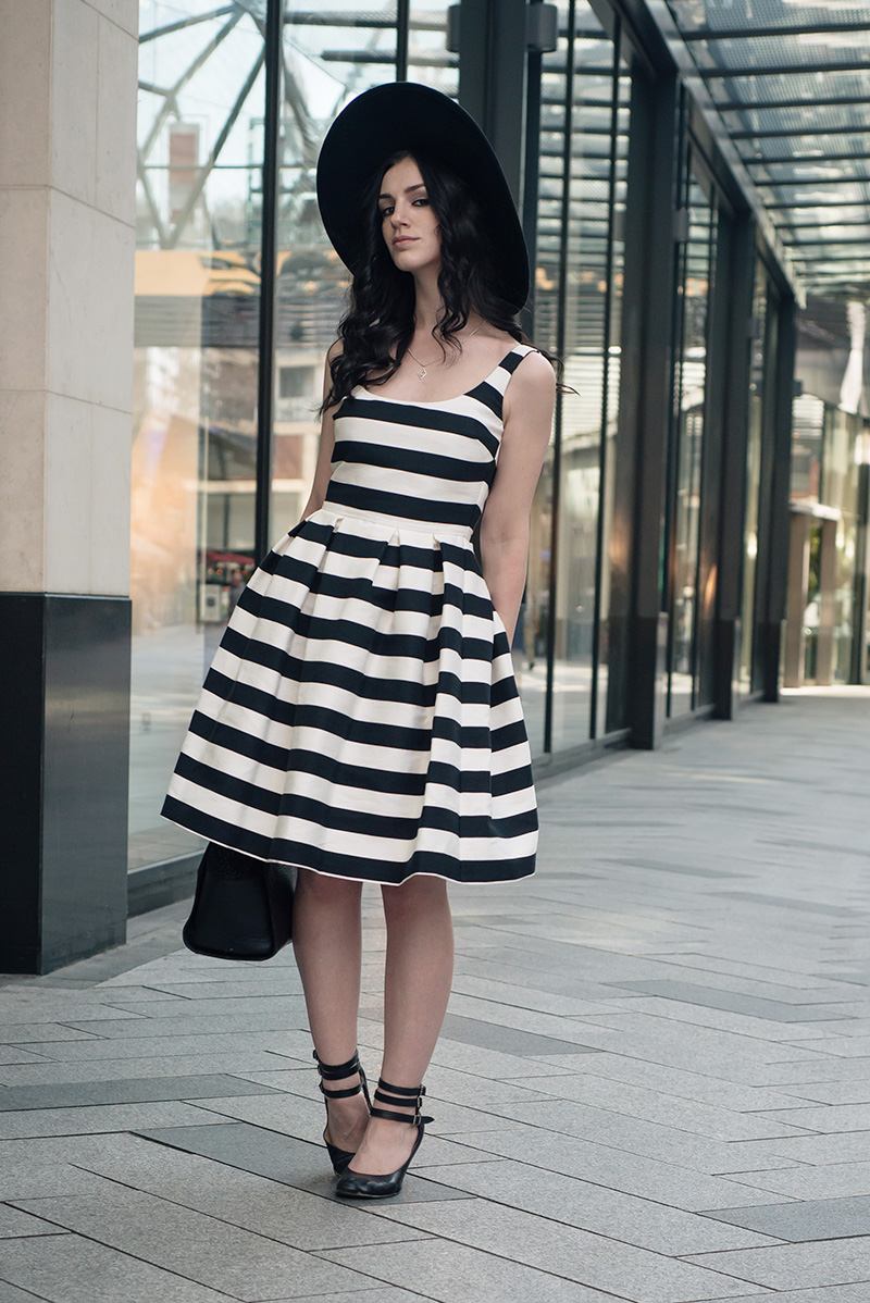 Fashion blogger Stephanie of FAIIINT wearing Warehouse black and white bold striped dress, H&M wide brim fedora, Vivienne Westwood animal toe mary jane shoes. Summer goth vintage street style outfit.
