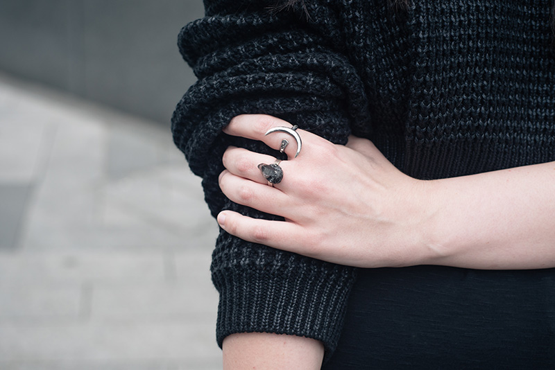 Fashion blogger Stephanie of FAIIINT wearing The Ragged Priest cropped chunky knit coated jumper, Wolf + Sadie Theurgy crecent silver ring, Elemental Luxury tibetan phantom quartz ring. All black everything dark style outfit details.