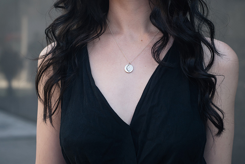 Fashion blogger Stephanie of FAIIINT wearing Ailsigr crescent moon and stars silver necklace. Outfit details.