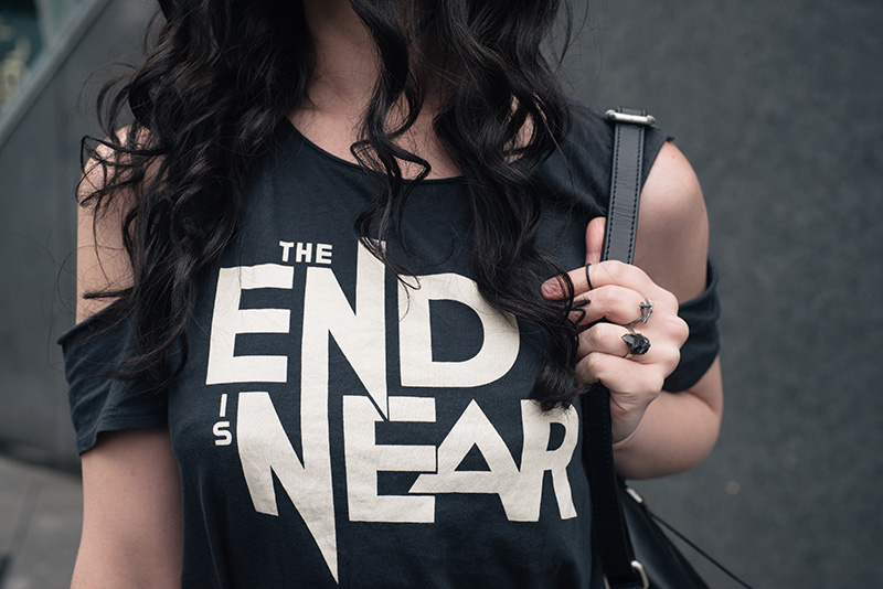 Fashion blogger Stephanie of FAIIINT wearing H&M The End Is Near tee, Hvnter Gvtherer kindling and lumen silver rings, Elemental Luxury black phantom quartz ring. All black everything street style outfit details.