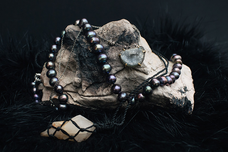FAIIINT jewellery picked up from travelling Thailand, Cambodia and China. Pale blue topaz druzy silver necklace, black rainbow pearls, milky white and orange quartz handmade wrapped raw crystal.