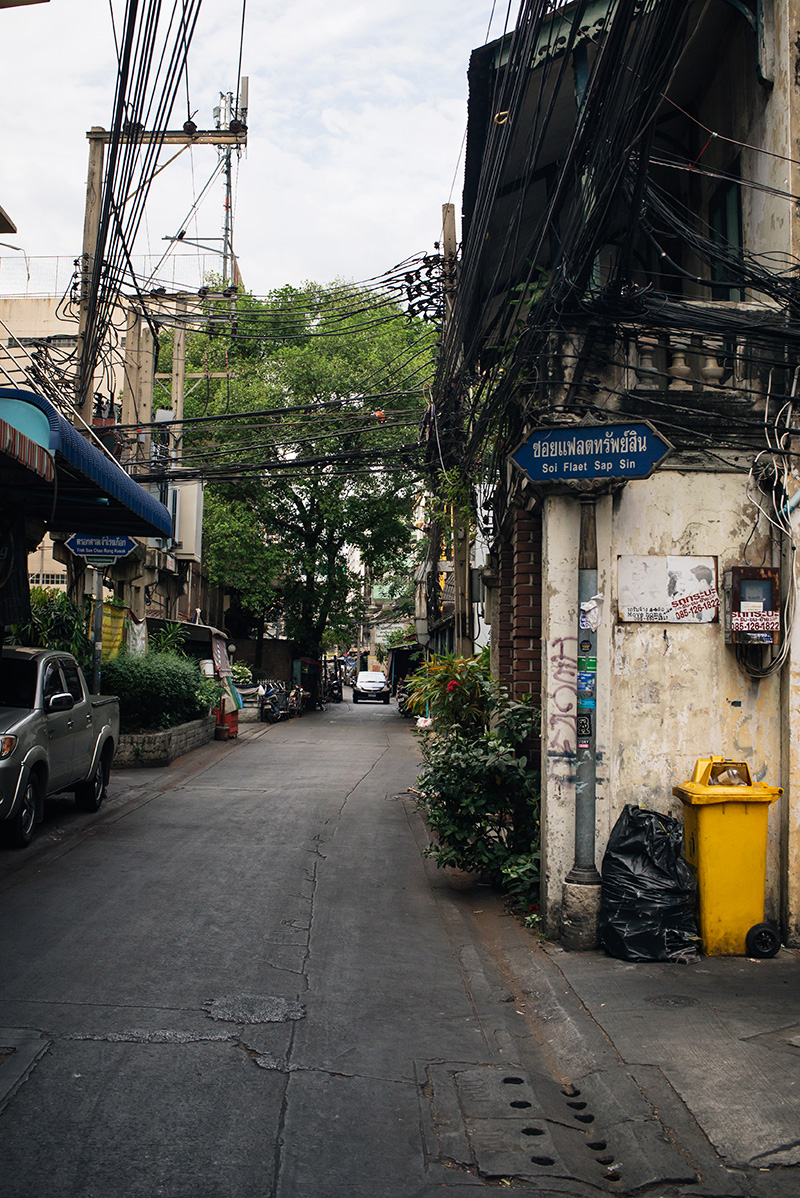 Bangkok Thailand Chinatown city streets with street sign.