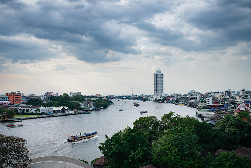 Bangkok Thailand Chinatown view of the Chao Phraya River from river front restaurant.