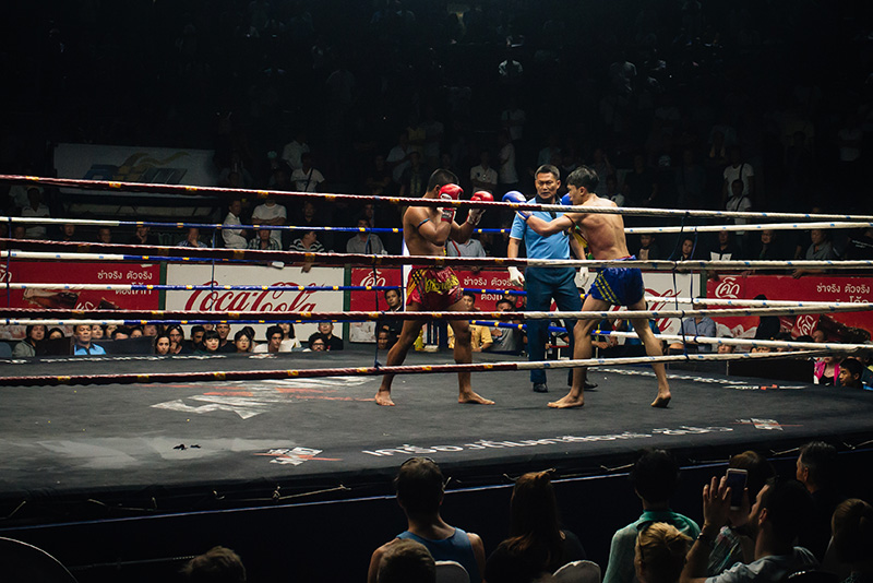 Bangkok Thailand Muay Thai fight in the ring at Rajadamnern Stadium.