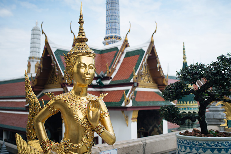 Temples of Bangkok Thailand, The Grand Palace and Wat Phra Kaew, gold kannari kinnon statue.