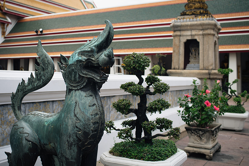 Temples of Bangkok Thailand, Wat Pho bronze lion statue.