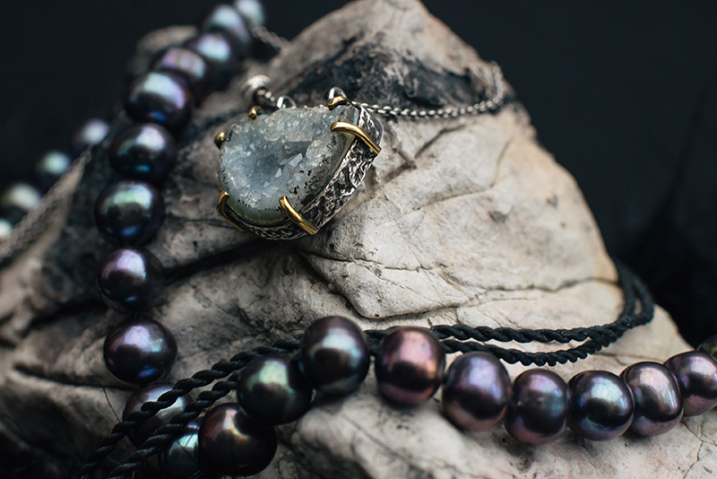 FAIIINT jewellery picked up from travelling Thailand, Cambodia and China. Pale blue topaz druzy silver necklace, black rainbow pearls, milky white and orange quartz handmade wrapped raw crystal.