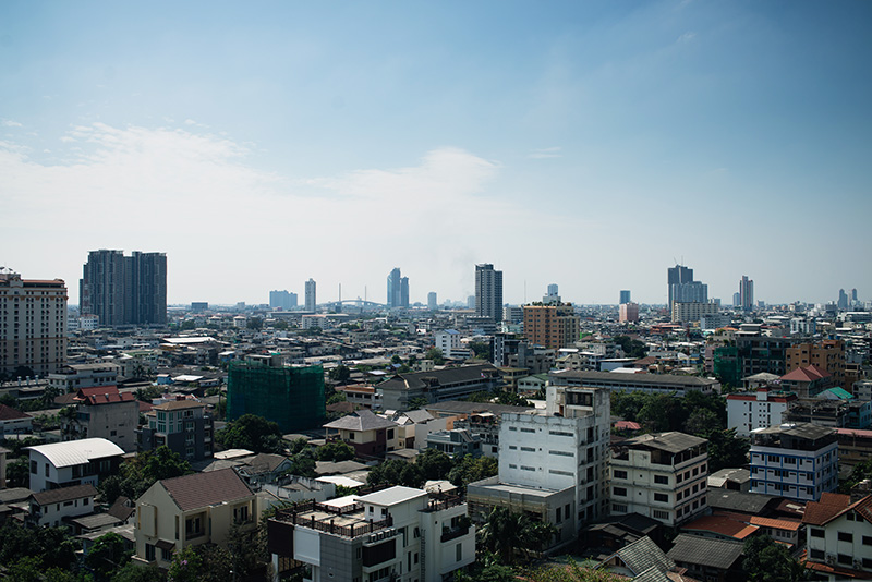 Anantara Sathorn Bangkok hotel Thailand city skyline view from balcony.