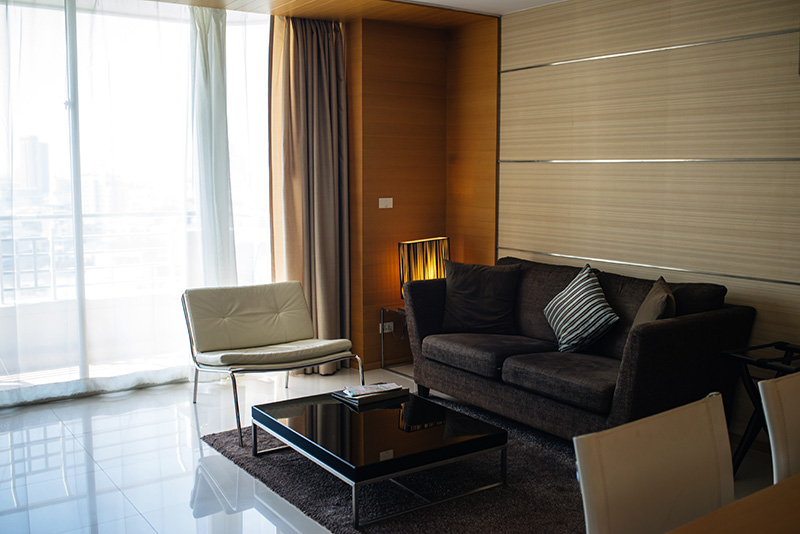 Anantara Sathorn Bangkok hotel Thailand room lounge area one bedroom suite.