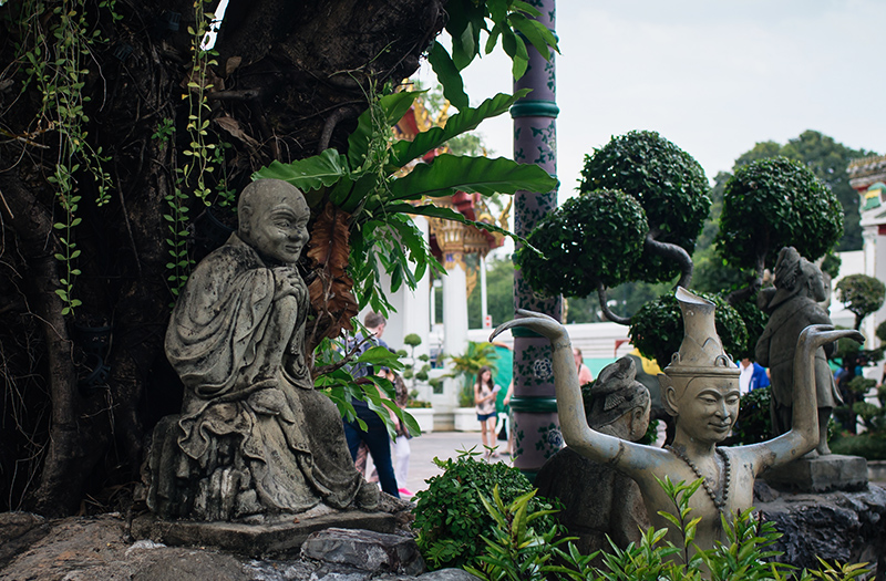 Temples of Bangkok Thailand, Wat Pho garden with statues.