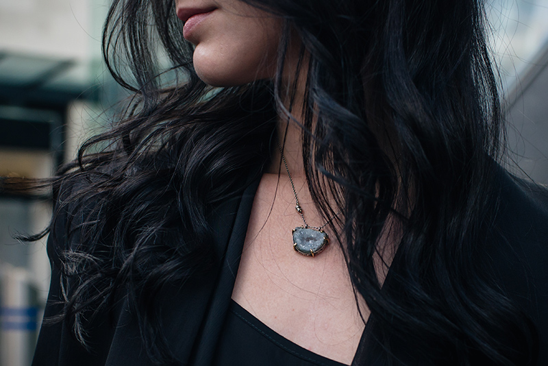Fashion blogger Stephanie of FAIIINT wearing The Silver Cafe Blue Topaz druzy crystal necklace. Dark style outfit details.