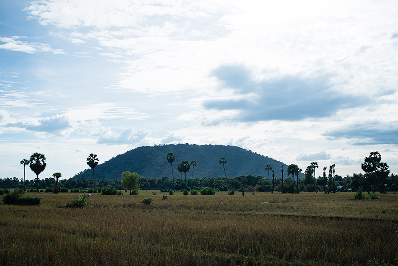 Countryside landscape in Siem Reap Cambodia, field and Phnom Kulen mountain.