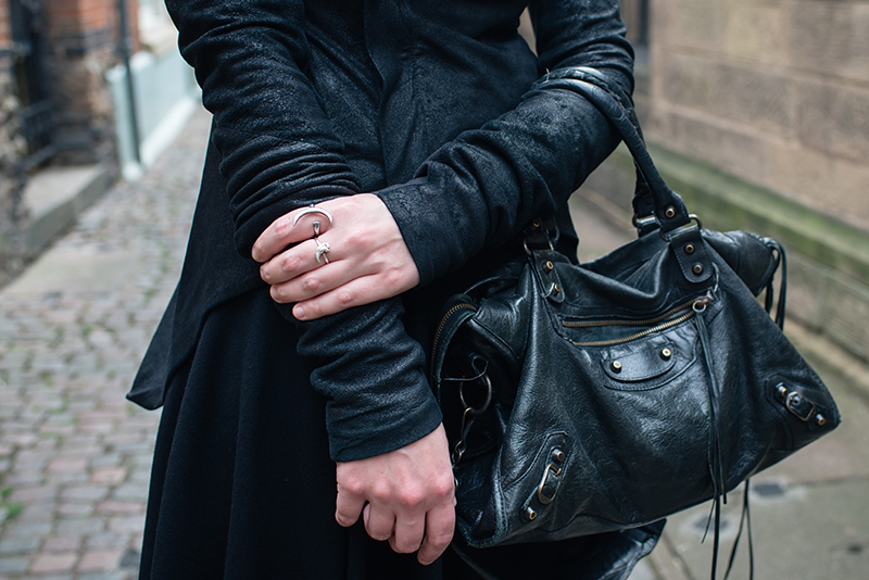Dark style fashion blogger Stephanie of FAIIINT wearing Rick Owens Naska blistered lamb leather jacket, Balenciaga city bag, Le Lou Ula & Birds N Bones silver claw rings. All black street style outfit details.