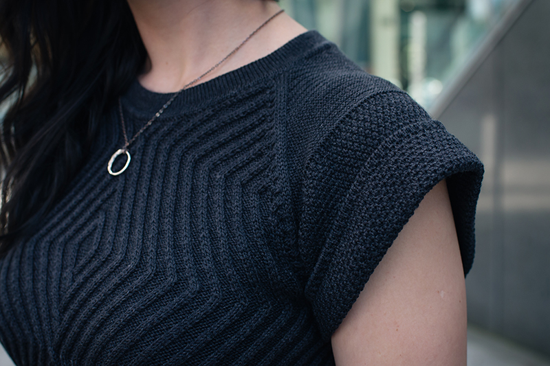 Dark style fashion blogger Stephanie of FAIIINT wearing Arura cable knit t-shirt jumper. Street style outfit details.