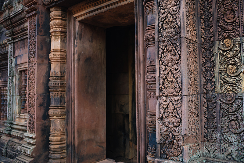 Banteay Srei Citadel of Women beautiful carved pink sandstone Hindu temple in Siem Reap Cambodia.