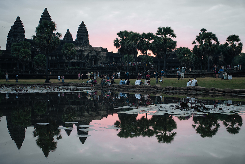 Pink purple sunrise at Angkor Wat temple complex Siem Reap Cambodia.