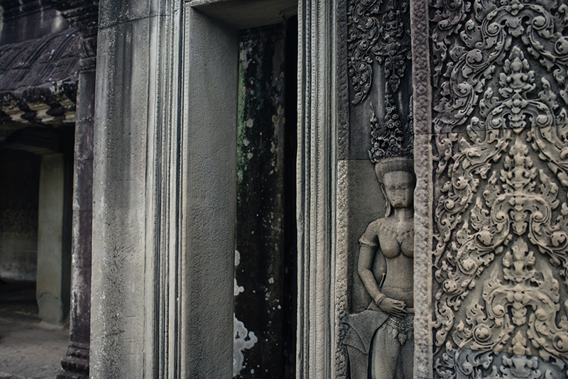 Detail of carvings at Angkor Wat temple complex Siem Reap Cambodia.