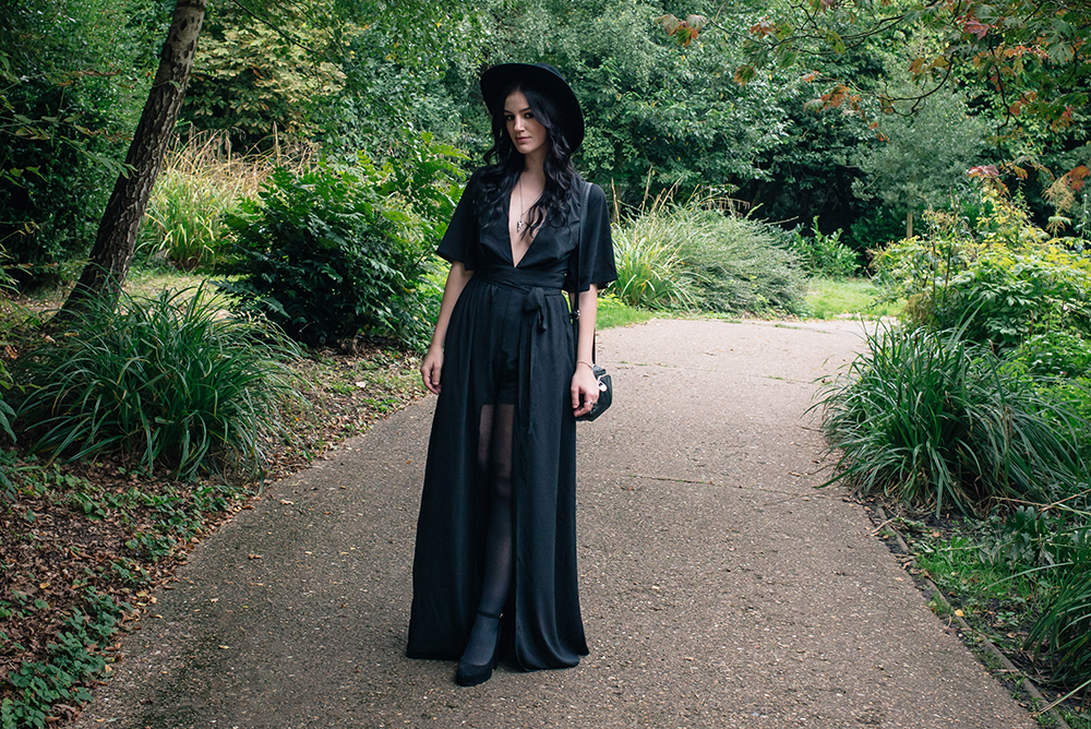 Fashion blogger Stephanie of FAIIINT wearing Tobi black maxi witchy kimono dress and wide brim hat. Dark gothic street style outfit.