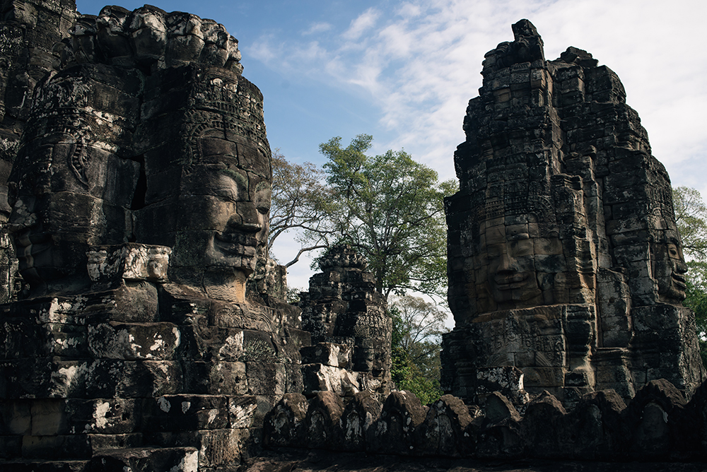 Bayon temple ruins Siem Reap Angkor Cambodia, faces sculptures.