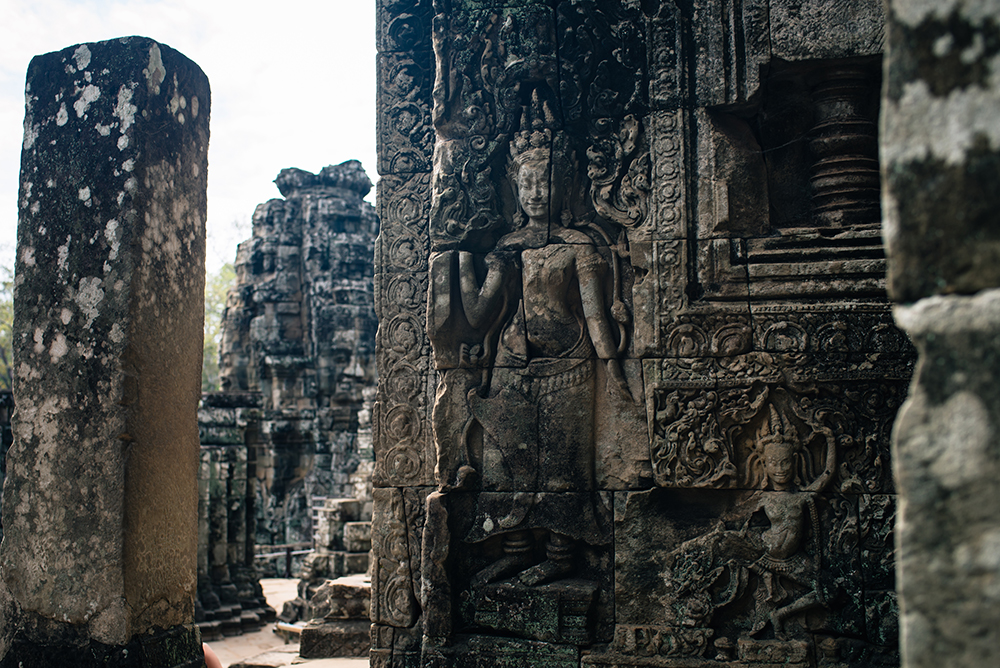 Bayon temple ruins Siem Reap Angkor Cambodia, details of carvings.