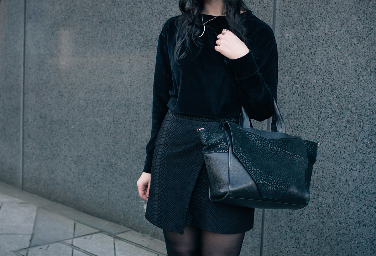 Fashion blogger Stephanie FAIIINT wearing Le Tee Paris velvet sweatshirt, Topshop snake textured skirt, Birds n Bones silver claw ring, Le Lou Ula Theurgy ring. All black outfit details.