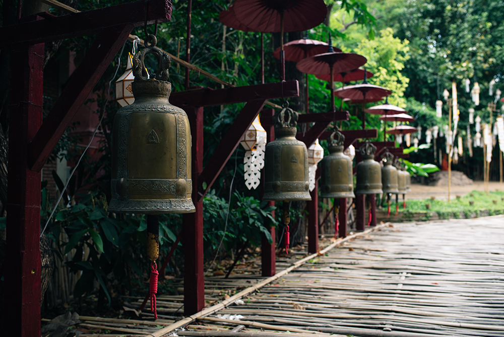 Wat Phan Tao bells in the garden, Chiang Mai Thailand.