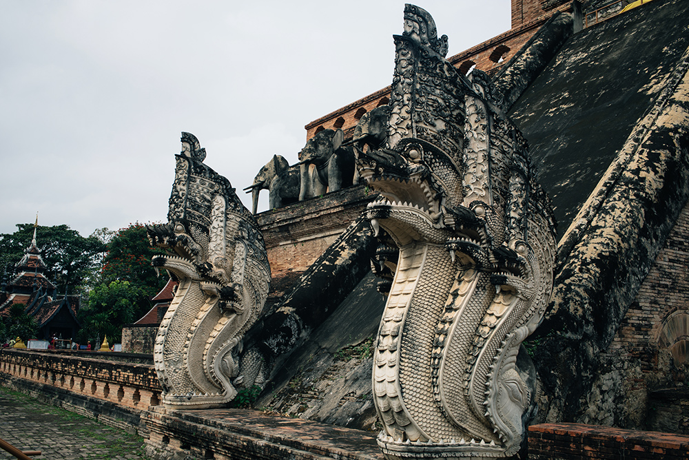 Wat Chedi Luang temple dragon statues, Chiang Mai Thailand.