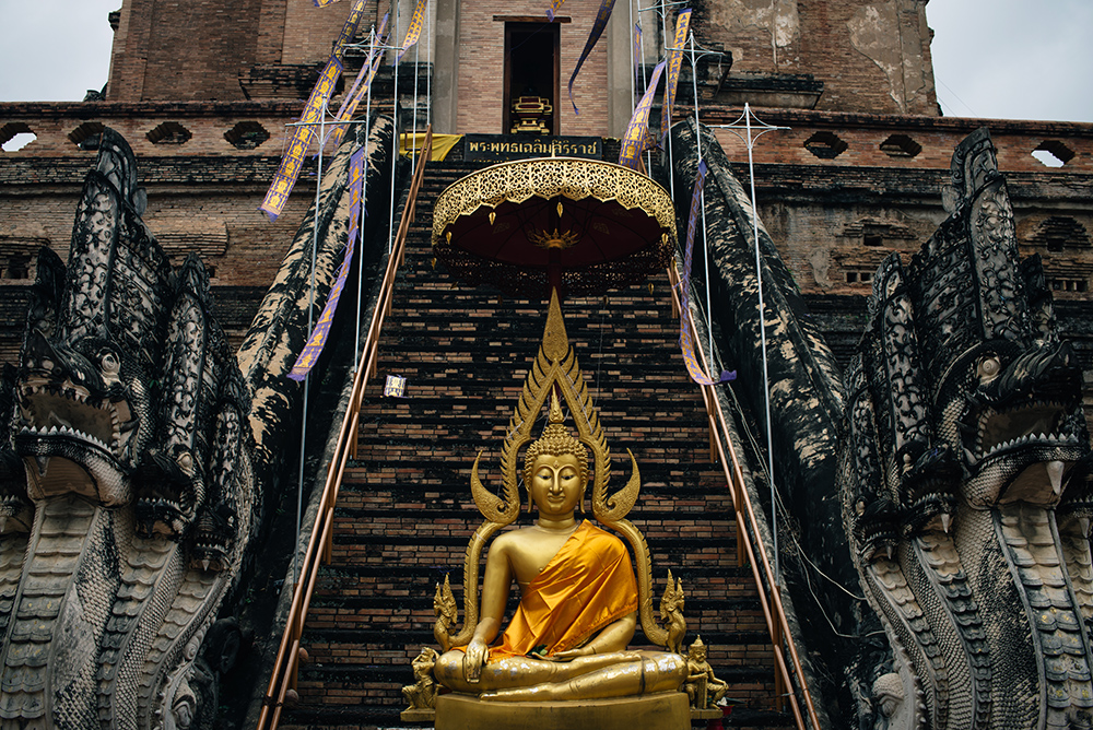 Wat Chedi Luang temple golden Buddha Chiang Mai Thailand.