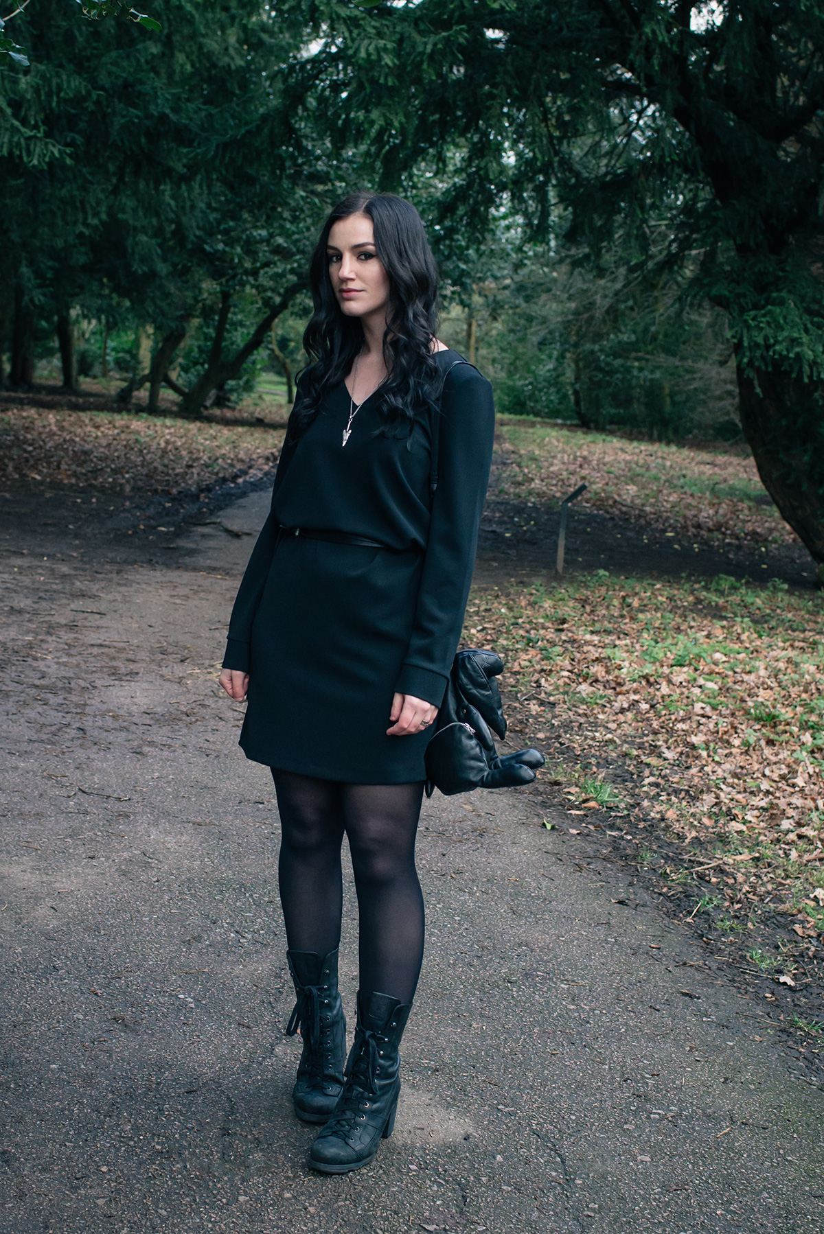 Fashion blogger Stephanie of FAIIINT wearing Le Tee Paris little black shift dress, O.X.S. lace up boots, Christopher Raeburn Hare bag. All black dark style outfit.