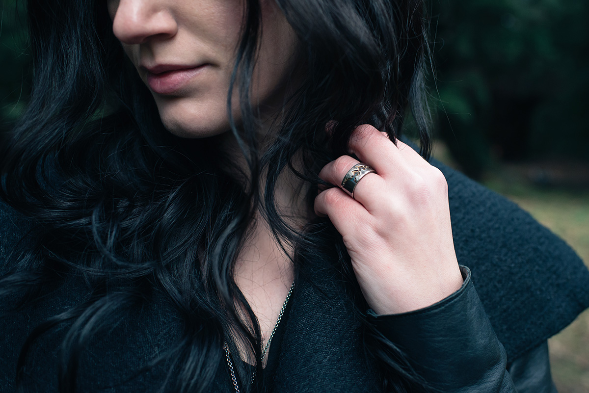 Fashion blogger Stephanie of FAIIINT wearing Velvet Aether blanket of ash silver ring. Dark style outfit details.