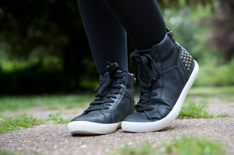 Fashion blogger Stephanie Brown FAIIINT wearing StylistPick Avery black, white & silver studded sneakers trainers