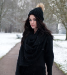Fashion Blogger FAIIINT wearing AllSaints chunky draped knitted wrap cardigan, Nelly fur pom pom beanie, Topshop Asymmetric top. Black outfit in the snow, snowing in the park.