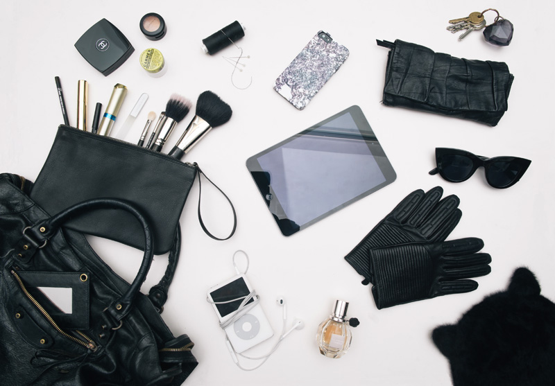 Fashion blogger Stephanie of FAIIINT what's in my Balenciaga city bag. Makeup, flowerbomb perfume, iPad mini, iPod, iPhone 5, Leather gloves, Next cat ear hat, ASOS Cat eye sunglesses, MAC Makeup brushes, Pieces leather pouch.