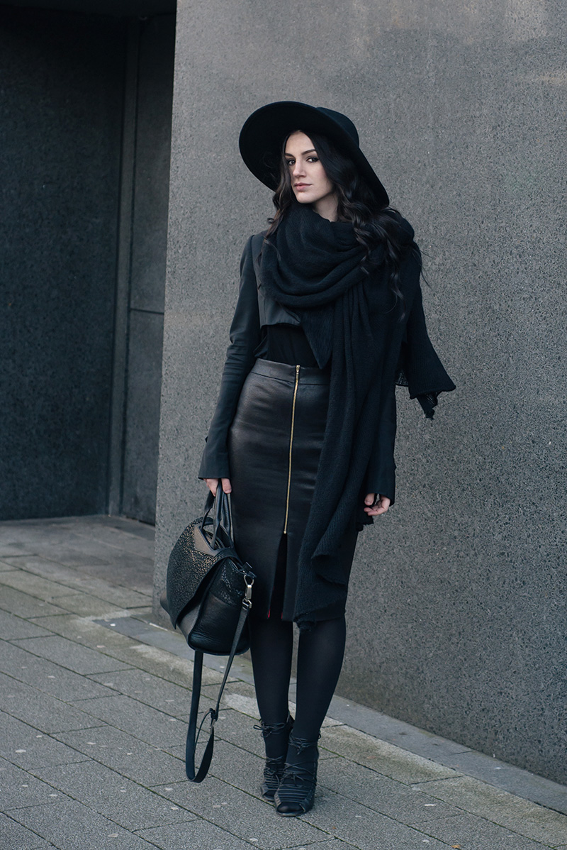 Fashion blogger Stephanie of FAIIINT wearing H&M fedora, Todd Lynn x Topshop cropped jacket, Rita and Phill custom fit Elaine skirt in snake, Skin by Finsk lace up wedges, ASOS draped scarf, Bracher Emden bag. All black everything dark style goth street style winter outfit.